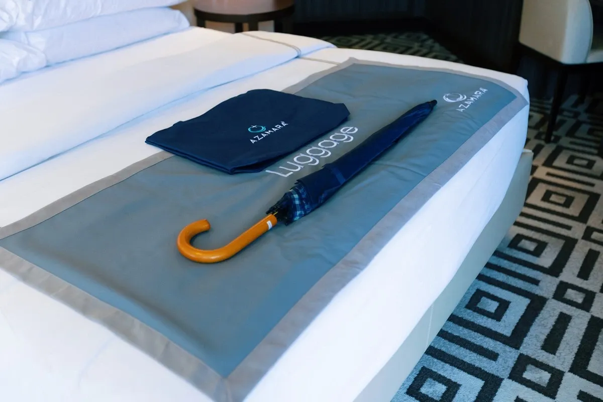 Azamara brand gifts on the suite bed