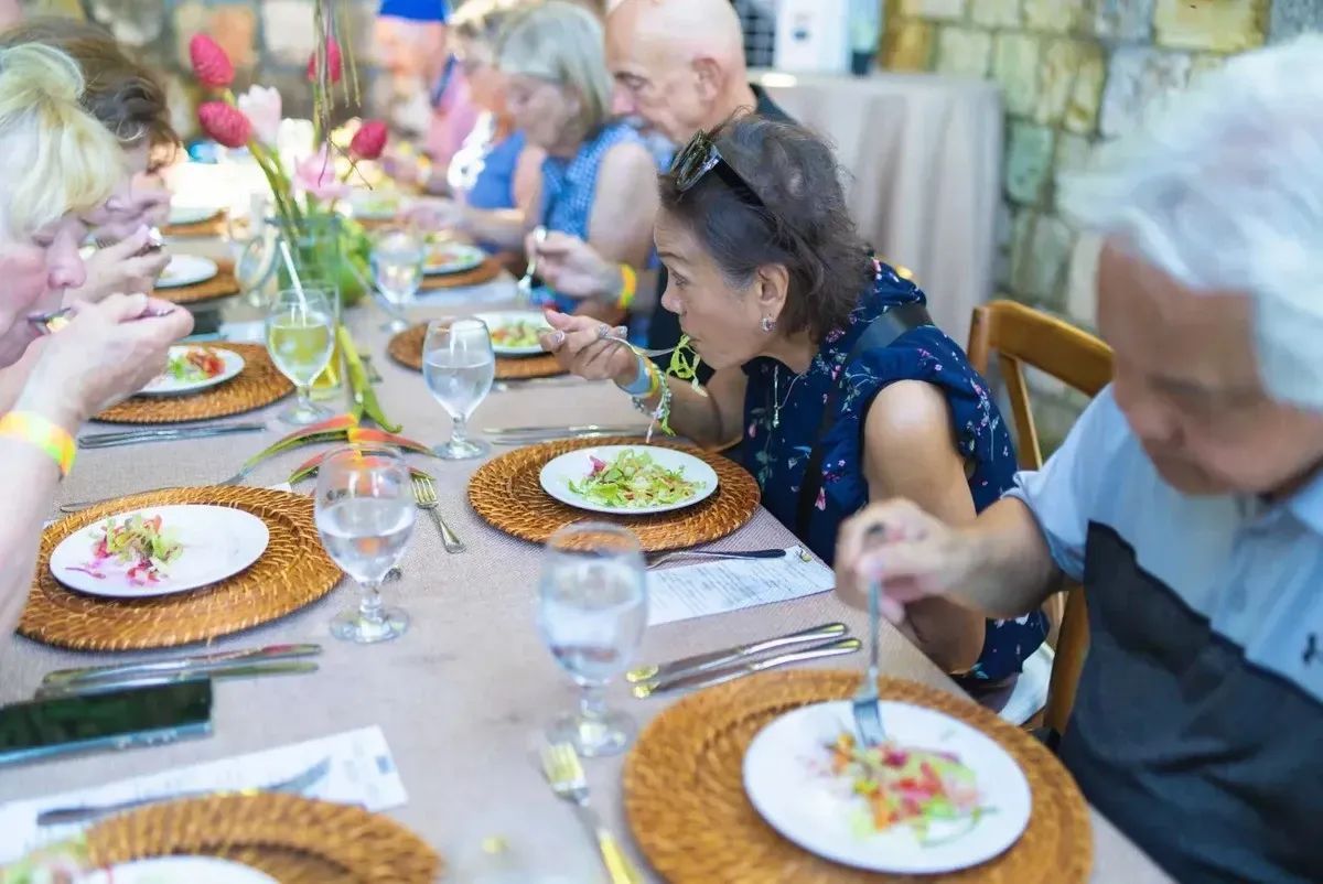 People eating at a large table