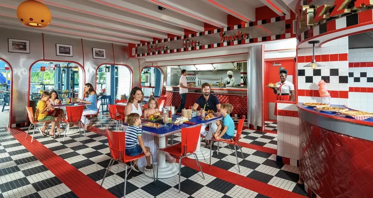 Family having dinner at a 50's style restaurant