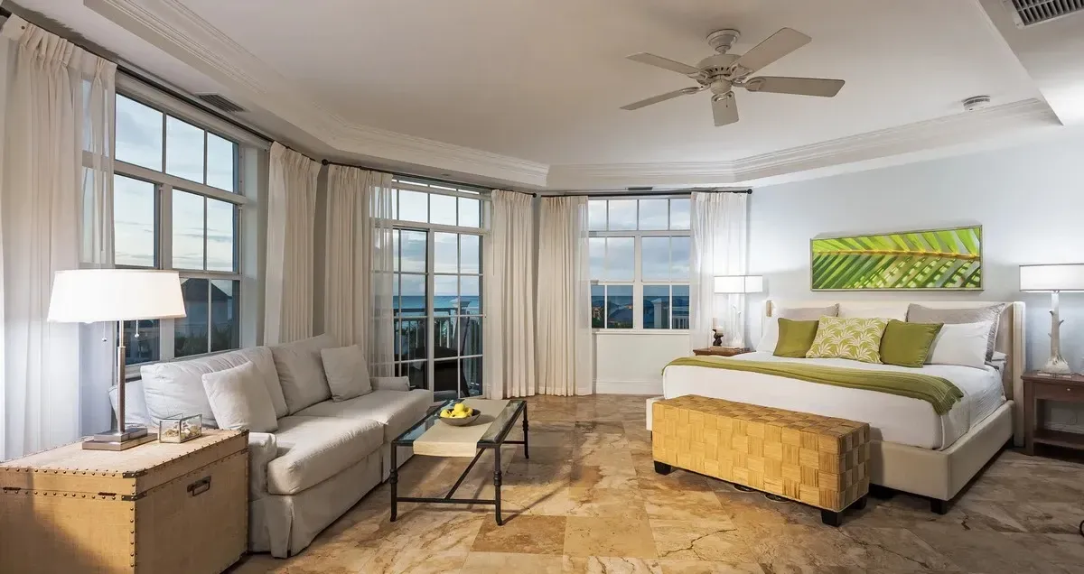 Beaches Resorts room with a king bed, living space and views to the beach