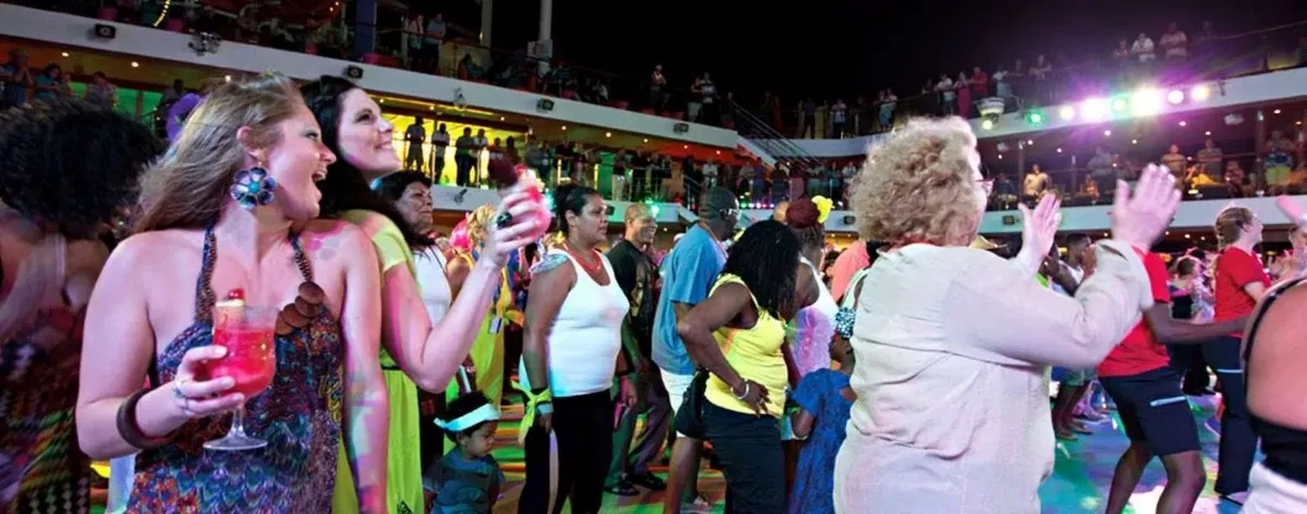 People having fun at night, dancing and clapping