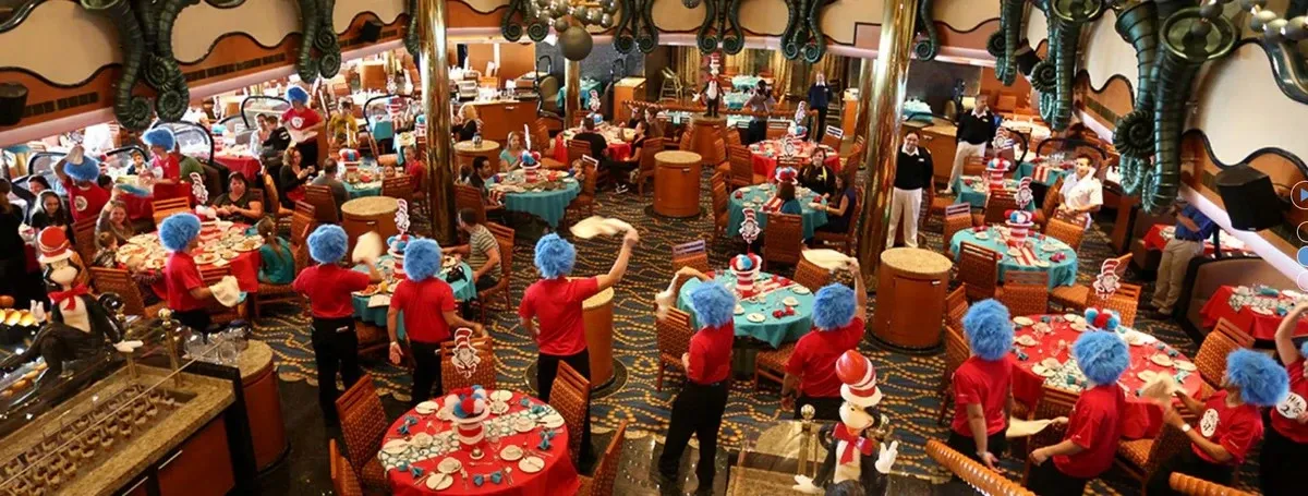 Panoramic view of a dining room with Carnival's crew giving an entertainment show