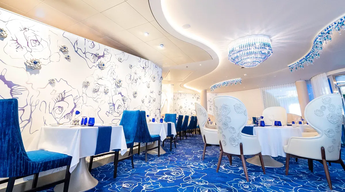 Panoramic view of a restaurant with blue and white decorations