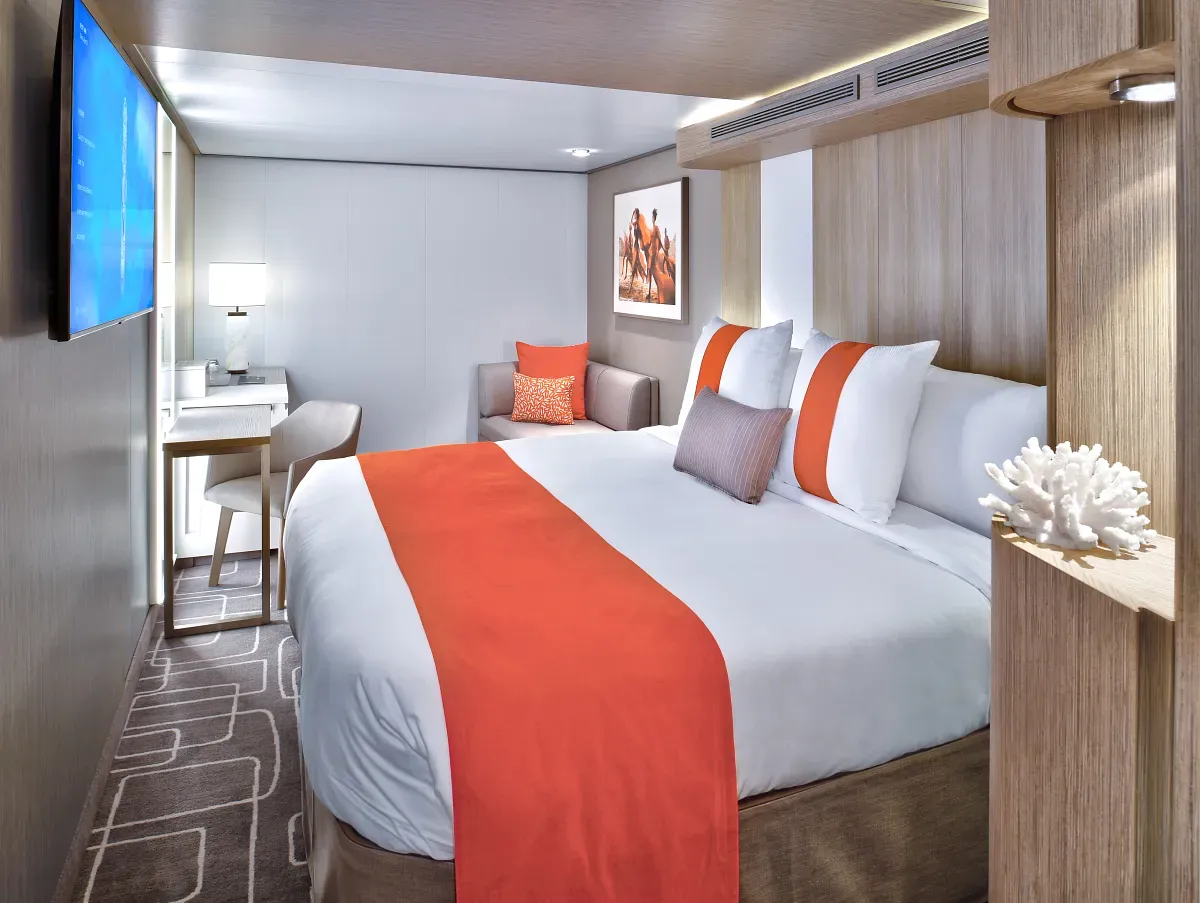 Cruise ship suite with a king bed 