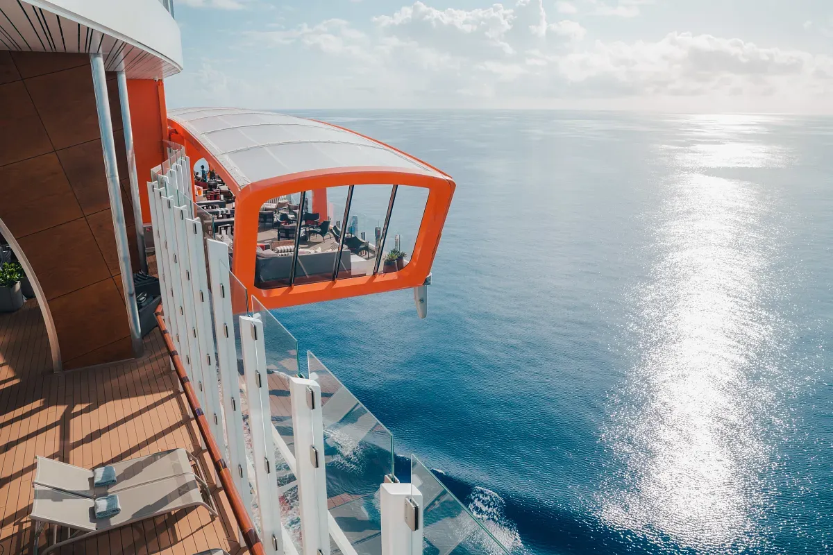 View from a side deck on a cruise ship and a floating platform