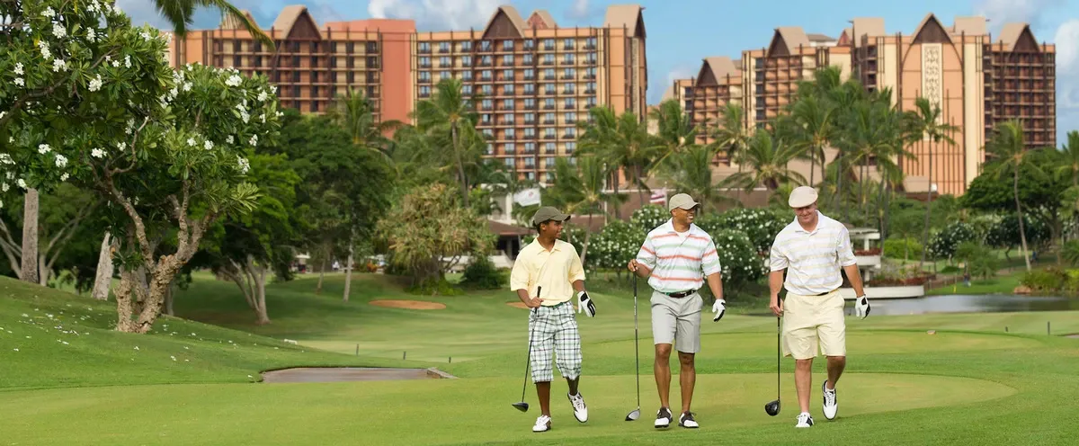 Men golfing at the beach resort court