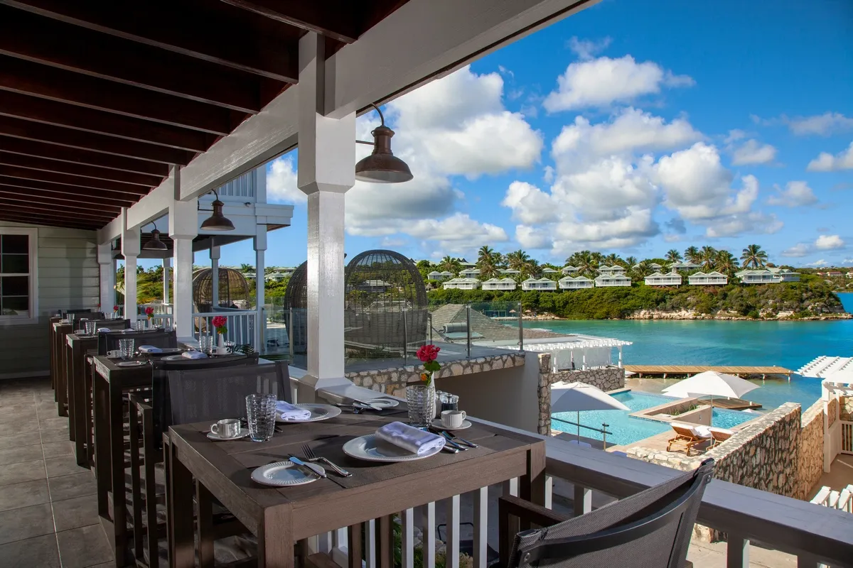 Balcony restaurant with views to the beach and the rest of the resort