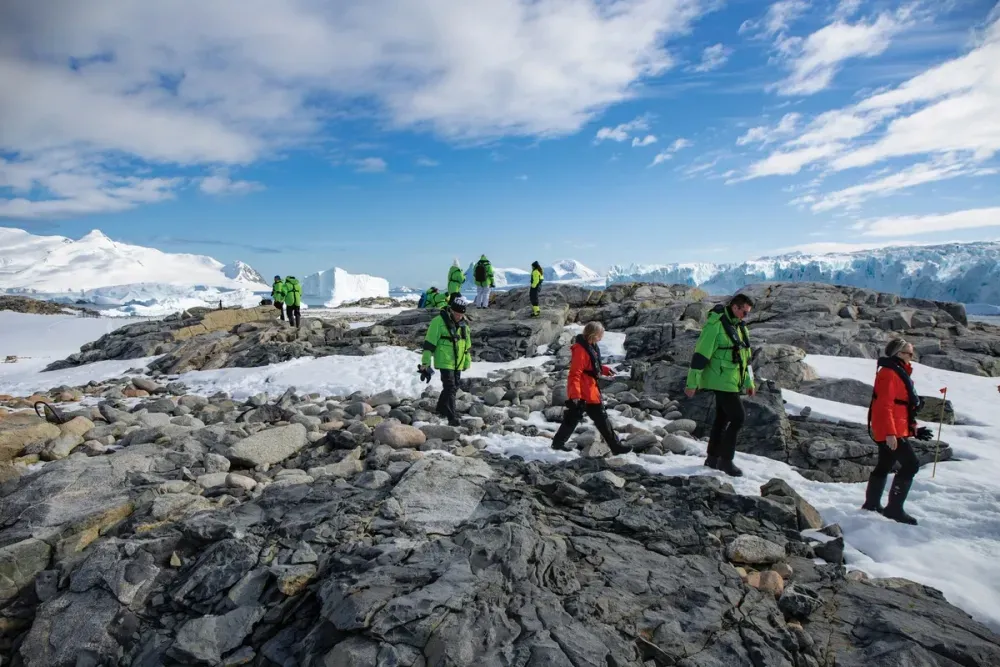 A group of people hiking on the Antartica
