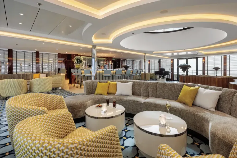 Lounge room inside an Atlas Ocean Voyages cruise ship