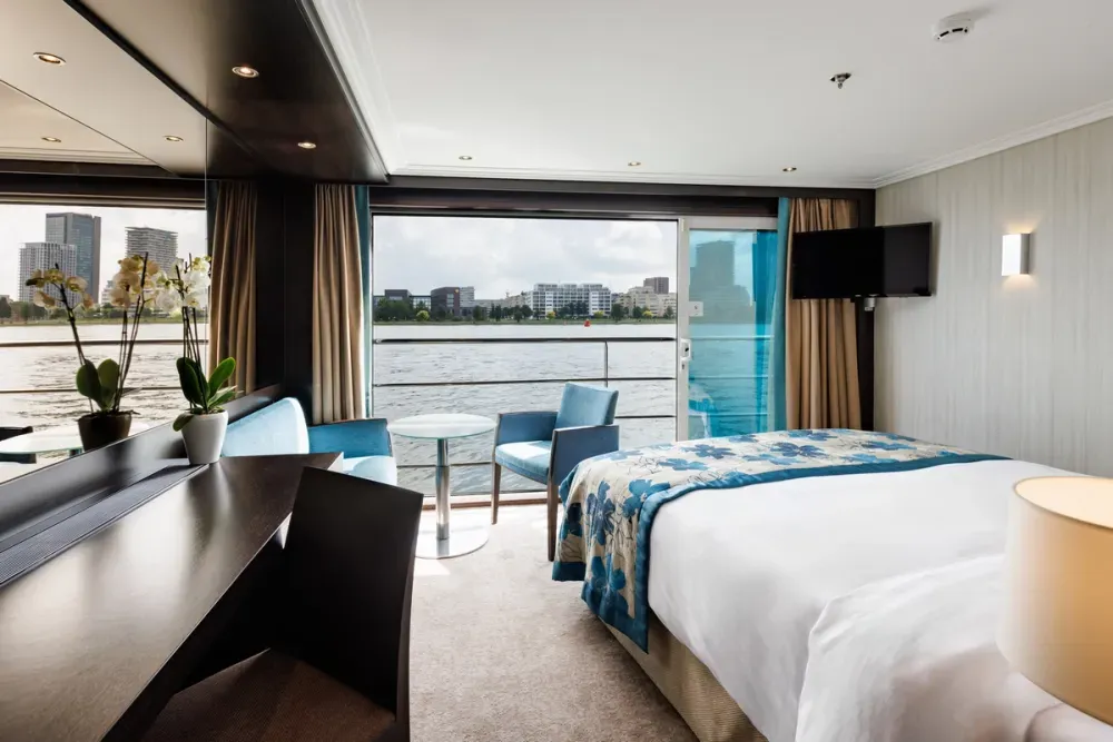 Stateroom with a balcony view to the river